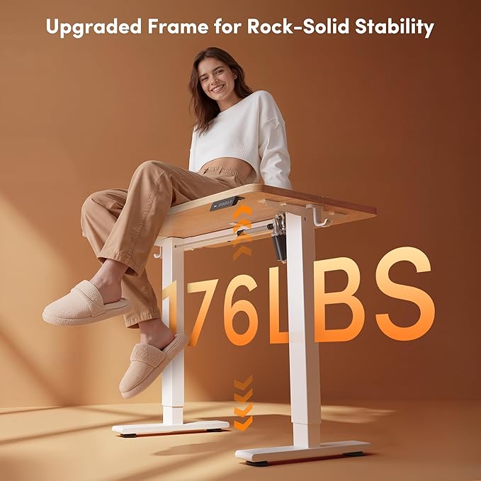FEZIBO Small Standing Desk, 32 × 19 Inches Electric Height Adjustable, Sit and Stand Up, Computer Office Desk with Splice Board, White Frame/Maple Top