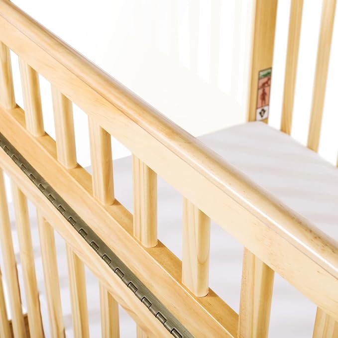 Child Craft Avery SafeAccess Wooden Compact Portable Crib, Features 2 Easy Roll Locking Wheels, Durable Wood Construction, Fits Through Doorways (Natural)
