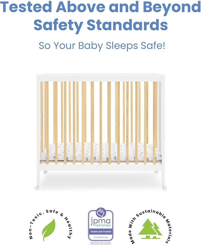 Delta Children Mia Portable Folding Mini Crib with 1.5-Inch Mattress - Greenguard Gold Certified, Bianca White/Natural