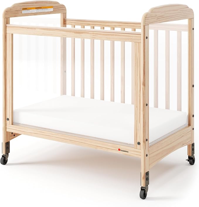 Foundations Serenity Compact 3 Side Clearview Daycare Crib Natural, Fixed Side, Durable Wood Construction, Non-Marking Casters (2 Locking), Includes 3” InfaPure Foam Mattress