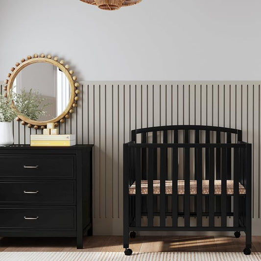 Davinci Dylan 3-in-1 Convertible Portable Mini Crib, Ebony | GREENGUARD Gold Certified - Folding Baby Crib With Wheels, 4 Adjustable Mattress Heights, Conversion Kit Sold Separately