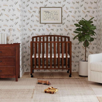 Davinci Dylan 3-in-1 Convertible Portable Mini Crib, Espresso | GREENGUARD Gold Certified - Folding Baby Crib With Wheels, 4 Adjustable Mattress Heights, Conversion Kit Sold Separately