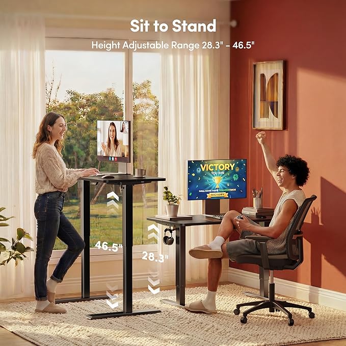FEZIBO Standing Desk, 55×28 Inches Electric Height Adjustable, Sit Stand Up, Computer Office Desk with Splice Board, Black Frame/Black TOP
