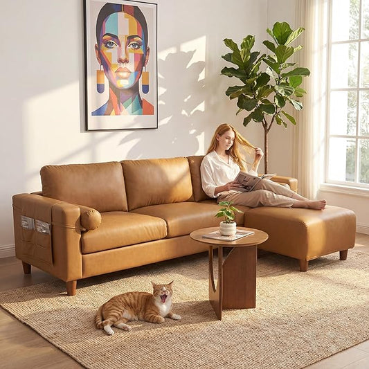 Vesgantti 100" L Shaped Faux Leather Couch with Movable Ottoman, 3 Seater PU Leather Sectional Sofa with Side Pocket, Mid Century Modern Modular Couch for Living Room, Bedroom, Camel Tan