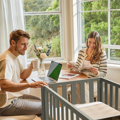 MAMAZING EvoNest 7-in-1 Convertible Baby Mini Crib with Wheels | GREENGUARD Gold Certified, New Zealand Pine Wood, 4 Adjustable Heights, Rocking Mode, Small Spaces Design, Grey