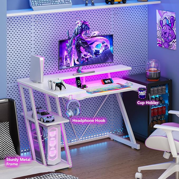 Korfile 40 Inch Gaming Desk with Power Outlet & LED Lights, L Shaped Computer Gaming Table with 3 Tiers Storage Shelves, Corner Gamer Desk with Monitor Stand for Small Space, Carbon Fiber White