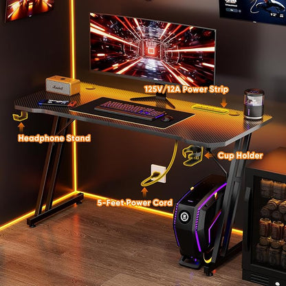 Czlolo 47 Inch Gaming Desk with Power Outlets, L-Shape Leg Computer Desk, Gamer Desk for Small Space, Wtih Cup Holder, Headphone Stand, USB＆ Tpye-C Ports, Carbon Fiber Surface, Black