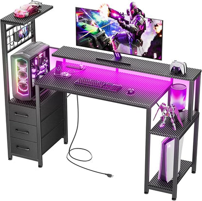 Korfile 48 Inch Gaming Desk with LED Lights & Power Outlets,Computer Desk with Fabric Drawers & Side Hook,Reversible Gamer Table with Monitor Stand for Game Room,Home Office,Carbon Fiber Black