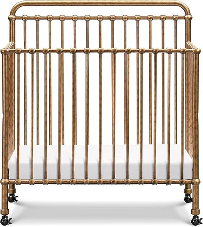 Namesake Winston 4-in-1 Convertible Mini Crib w/Wheels Durable Metal | GREENGUARD Gold Certified - Portable, Metal Baby Crib w/ Removable Wheels - Converts to Toddler Bed, Daybed & Twin Size Bed