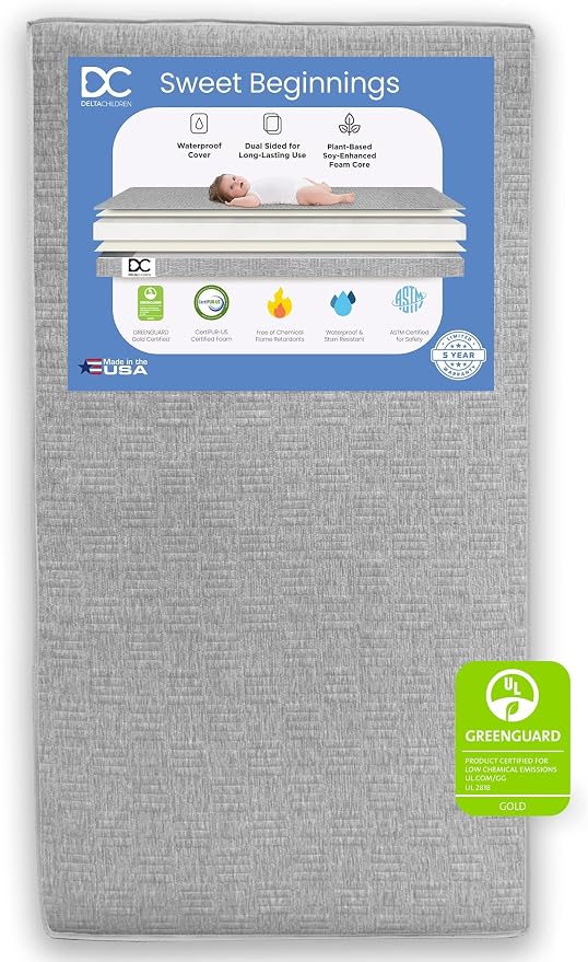 Delta Children Sloane Crib 7-Piece Baby Nursery Furniture Set–Includes: Convertible Crib, Dresser, Changing Top, Crib Mattress, Fitted Sheets, Toddler Guardrail & Changing Pad, Black w/Melted Bronze