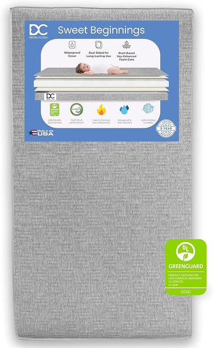 Delta Children Sloane Crib 7-Piece Baby Nursery Furniture Set–Includes: Convertible Crib, Dresser, Changing Top, Crib Mattress, Fitted Sheets, Toddler Guardrail & Changing Pad, Black w/Melted Bronze