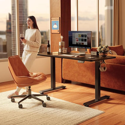 FEZIBO Standing Desk, 55×28 Inches Electric Height Adjustable, Sit Stand Up, Computer Office Desk with Splice Board, Black Frame/Black TOP