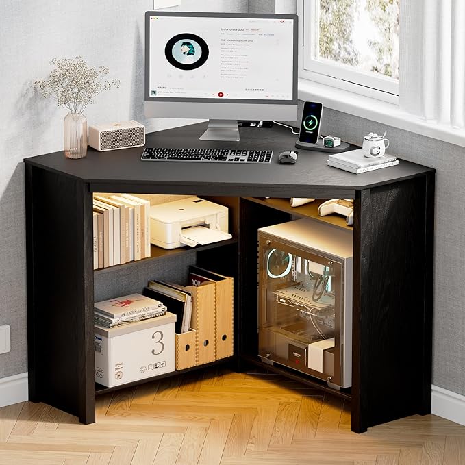 Corner Desk with Charging Station and LED Lights, Black | Triangle gaming computer desk for home office. Features space saving storage shelves, CPU stand, and smart LED light