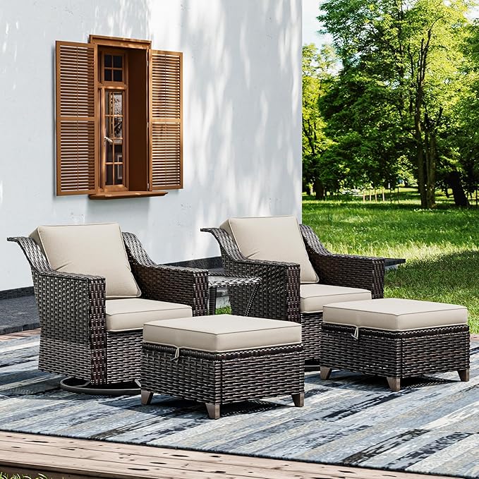 Outdoor patio furniture set with wicker chairs and ottomans on a deck.