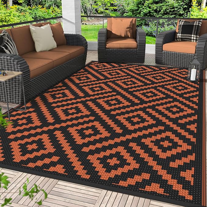 GENIMO Outdoor Rug for Patio, 6'x9' Fall Reversible Plastic Straw Rugs, Waterproof Halloween RV Camping Mat Lightweight Carpet for Camper, Balcony, Deck, Backyard, Picnic, Black Orange