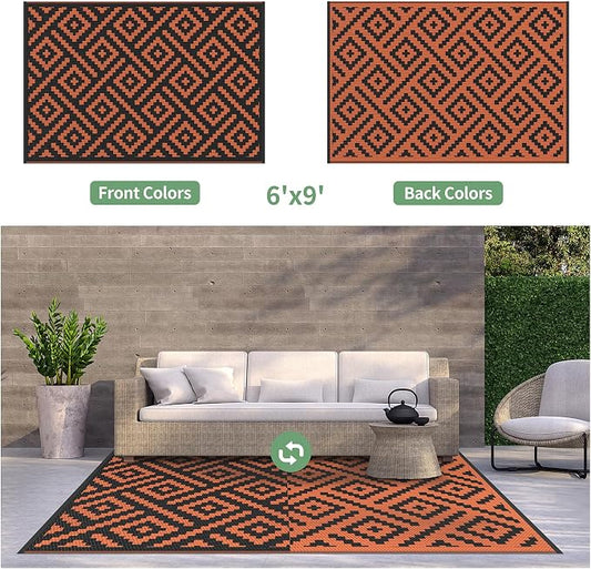 GENIMO Outdoor Rug for Patio, 6'x9' Fall Reversible Plastic Straw Rugs, Waterproof Halloween RV Camping Mat Lightweight Carpet for Camper, Balcony, Deck, Backyard, Picnic, Black Orange