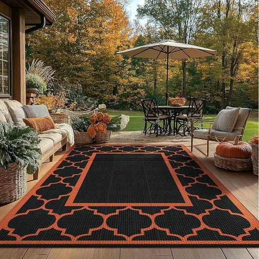 GENIMO 6' x 9' Outdoor Rug Waterproof for Patio Decor, Foldable Reversible Plastic Straw Area Rugs Mat for Camper, Outside Carpet for Rv, Deck, Porch, Picnic, Beach, Balcony, Black & Orange