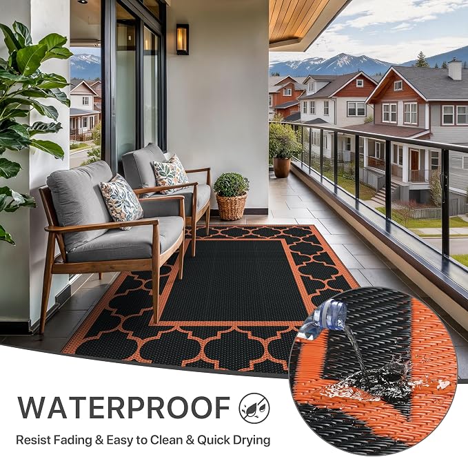 GENIMO 6' x 9' Outdoor Rug Waterproof for Patio Decor, Foldable Reversible Plastic Straw Area Rugs Mat for Camper, Outside Carpet for Rv, Deck, Porch, Picnic, Beach, Balcony, Black & Orange